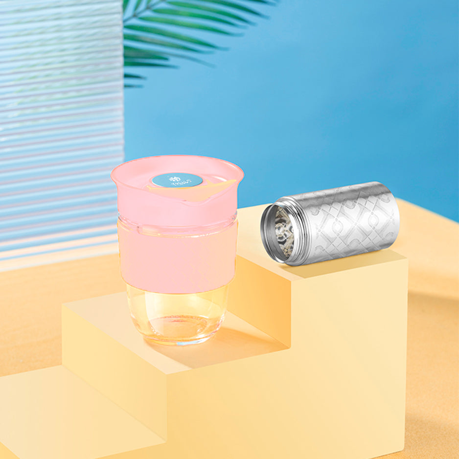 Travel glass with infuser to prepare coffee and tea